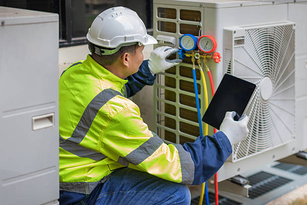 Professional Air Duct Cleaning technician working in Astor, FL
